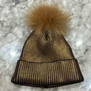 Adrienne Landau gold metallic beanie with faux fur Pom